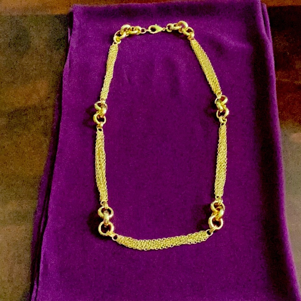 Goldtone 30” necklace with lobster claw clasp.